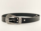 Black leather belt with silver buckle on a white background