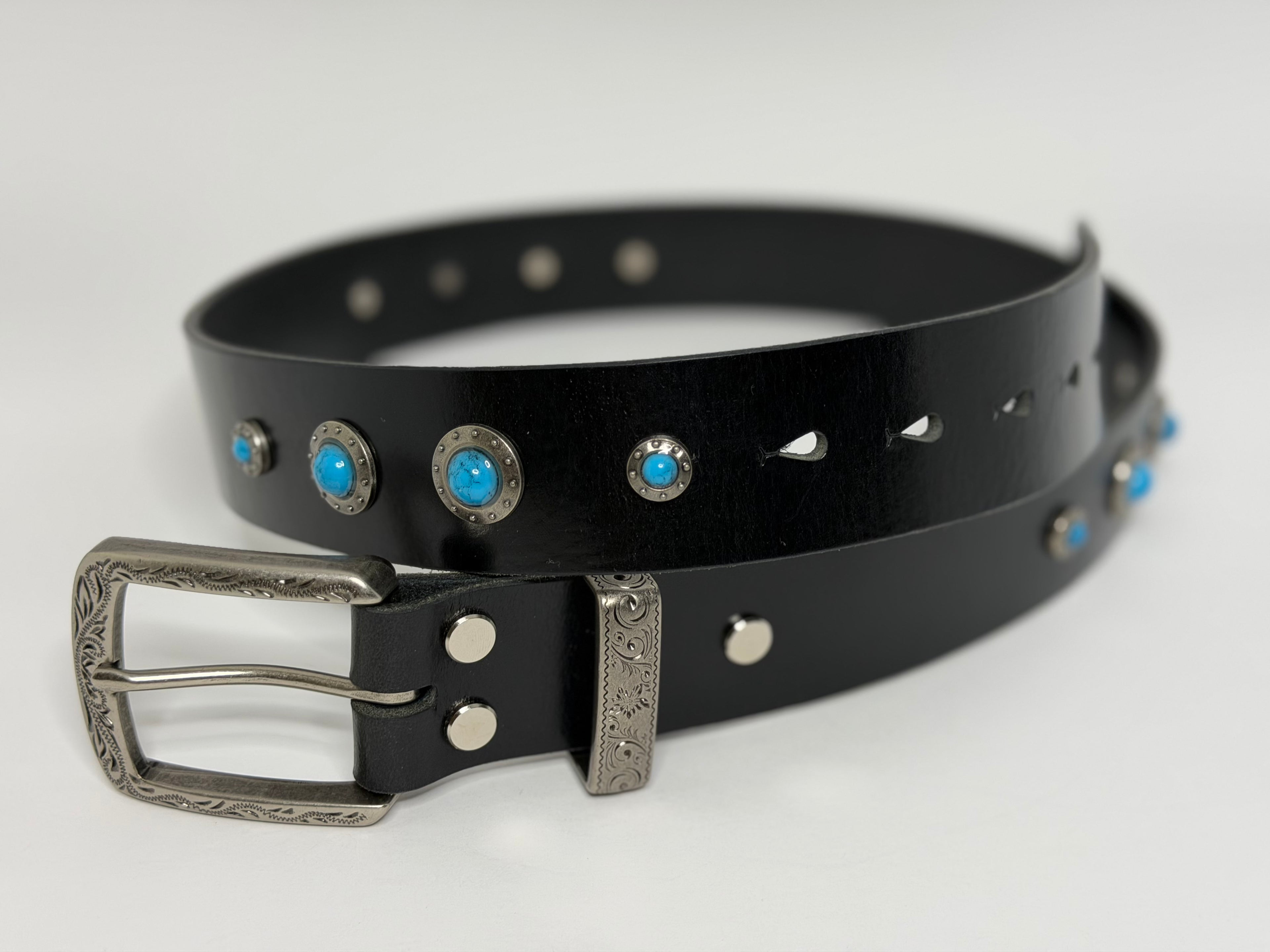 Black leather belt with silver buckle and turquoise conchos on a white background