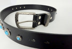 Black leather belt with silver buckle and turquoise conchos on a white background