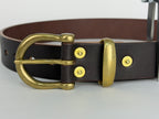 Close up picture of a brown leather belt with a brass buckle, keeper and rivets.