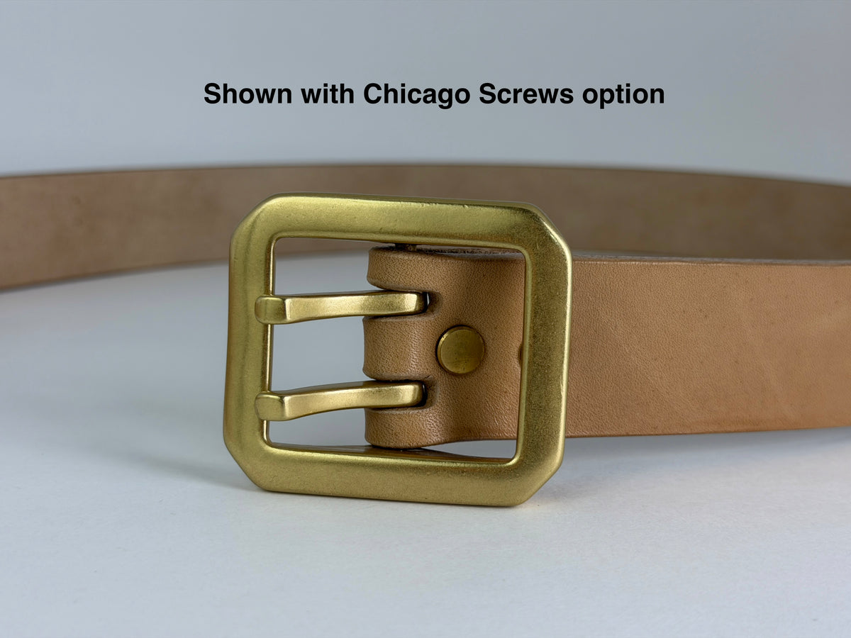 A natural leather belt with a rectangular dual-pronged brass buckle, shown with the text 'Shown with Chicago Screws option' at the top against a light gray background.