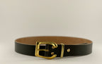 Dark green belt with a gold buckle on a light gray background