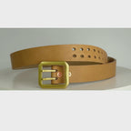 A thick natural leather belt with a large rectangular dual-pronged  brass buckle, on a white carousel.  The carousel spins around, showing the belt in 360 degrees.