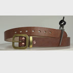 Video of a brown leather belt with brass octagonal-shaped buckle, keeper and brass rivets.  The video shows this belt rotating 360 degrees on a carousel.