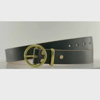 Video of a dark green leather belt with a circular brass buckle on a carousel
