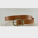 Video of a brown leather belt with brass buckle and keeper revolving on a carousel showing a 360 degree view of the belt
